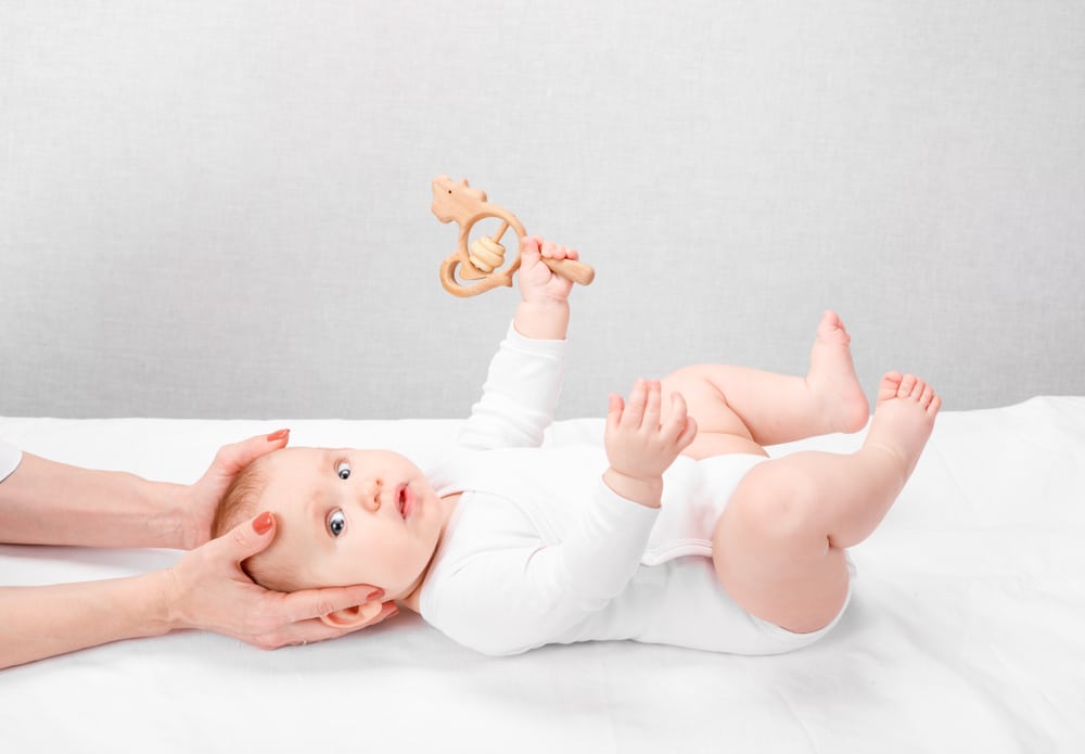 Osteopath treating a baby