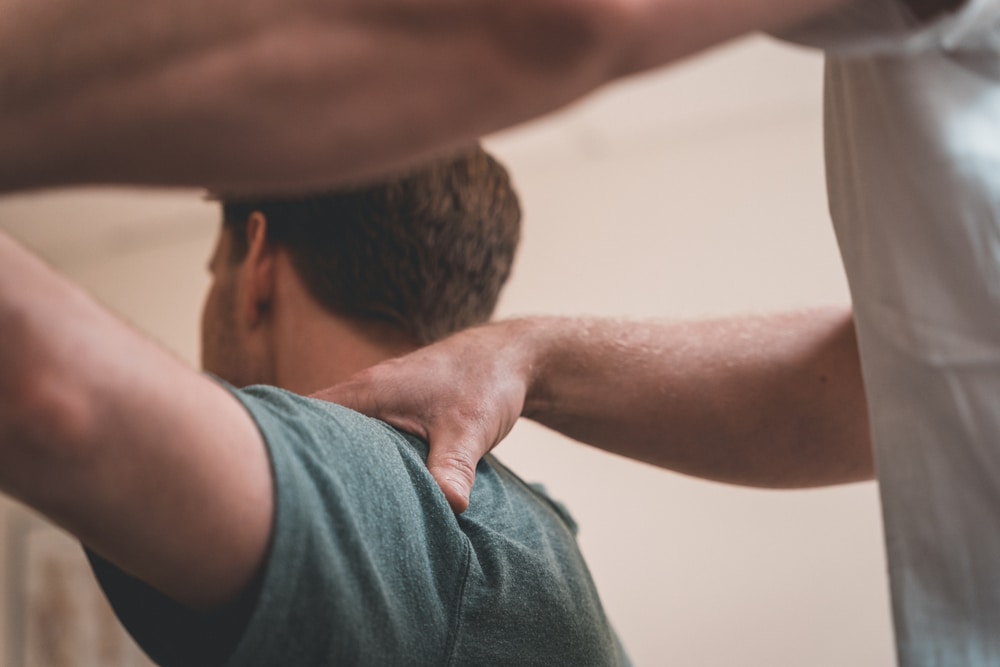 Osteopath treating a patient